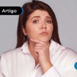 Imagem ilustra mulher pensativa.