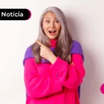 imagem de pessoa mais velha com suéter rosa e roxo