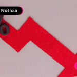 Ilustração de seta vermelha caindo e sinal de porcentagem ao lado.