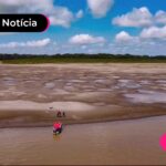 Pescadores em região de seca no Norte.