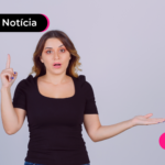 Jovem lendo notícia comparando o salário mínimo de 2024 e 2025.