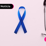 Imagem de um laço azul e um instrumento médico
