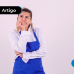 Mulher jovem com avental se perguntando "porque não recebo auxílio gás"?