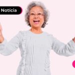 Pessoa de idade sorrindo após ler notícia sobre aumento das parcelas do consignado.