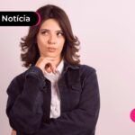 jovem pensando sobre mudança no saque do FGTS.