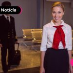 Trabalhadora CLT sorrindo após ler notícia sobre margem do consignado privado.