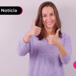Mulher fazendo positivo com dedo