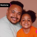 Pai e filha sorrindo para a foto