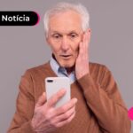 Aposentado com expressão de dúvida após ler notícia sobre fraude do INSS.