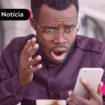 Jovem chocado com notícia sobre combate a DeepFake nas eleições.