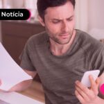 Homem lendo noticia datatudo sobre a antecipação do FGTS.