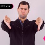Homem fazendo sinal de negativo sobre o programa move Brasil.