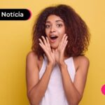 Jovem feliz porque governo liberou hoje nova garantia para empréstimo CLT.