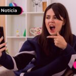 Mulher feliz com nova notícia sobre o desenrola brasil.