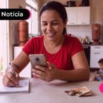 Beneficiária do Bolsa Família feliz com antecipação.